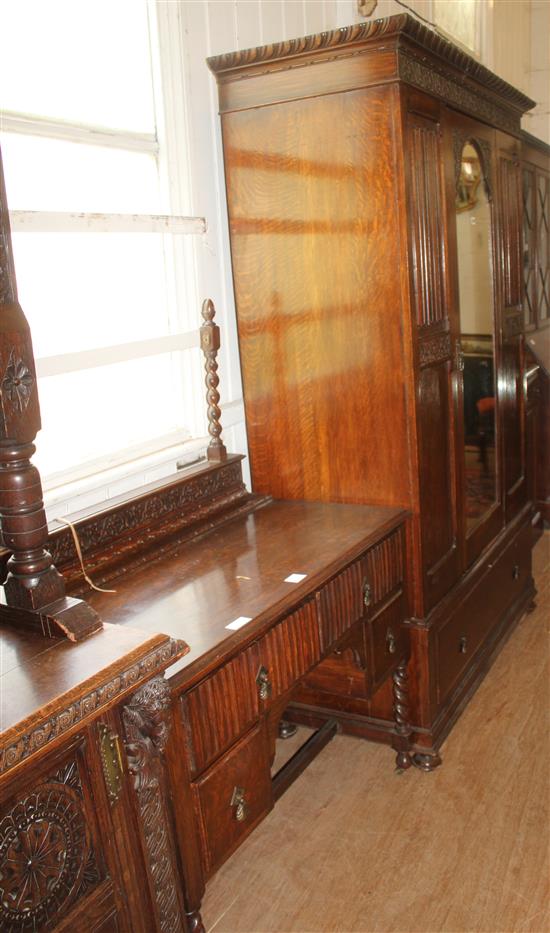 1920s oak linenfold carved wardrobe and a matching dressing table (2)